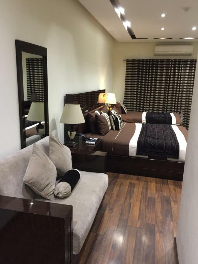 Royaute Luxury Suites And Hotel Gulberg Lahore Buitenkant foto
